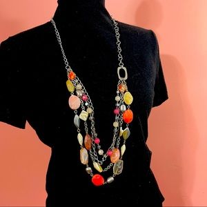 Multiple chain long woman’s necklace